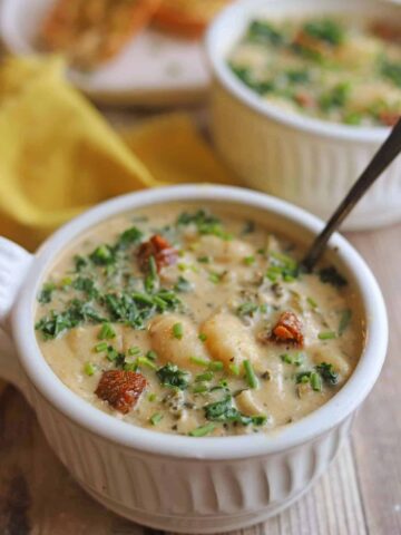 Vegan gnocchi sausage soup in a bowl.
