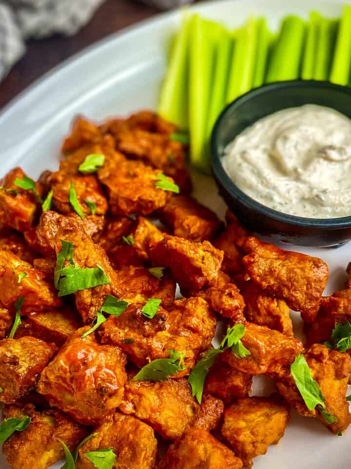 Closeup of Buffalo tofu on a plate.