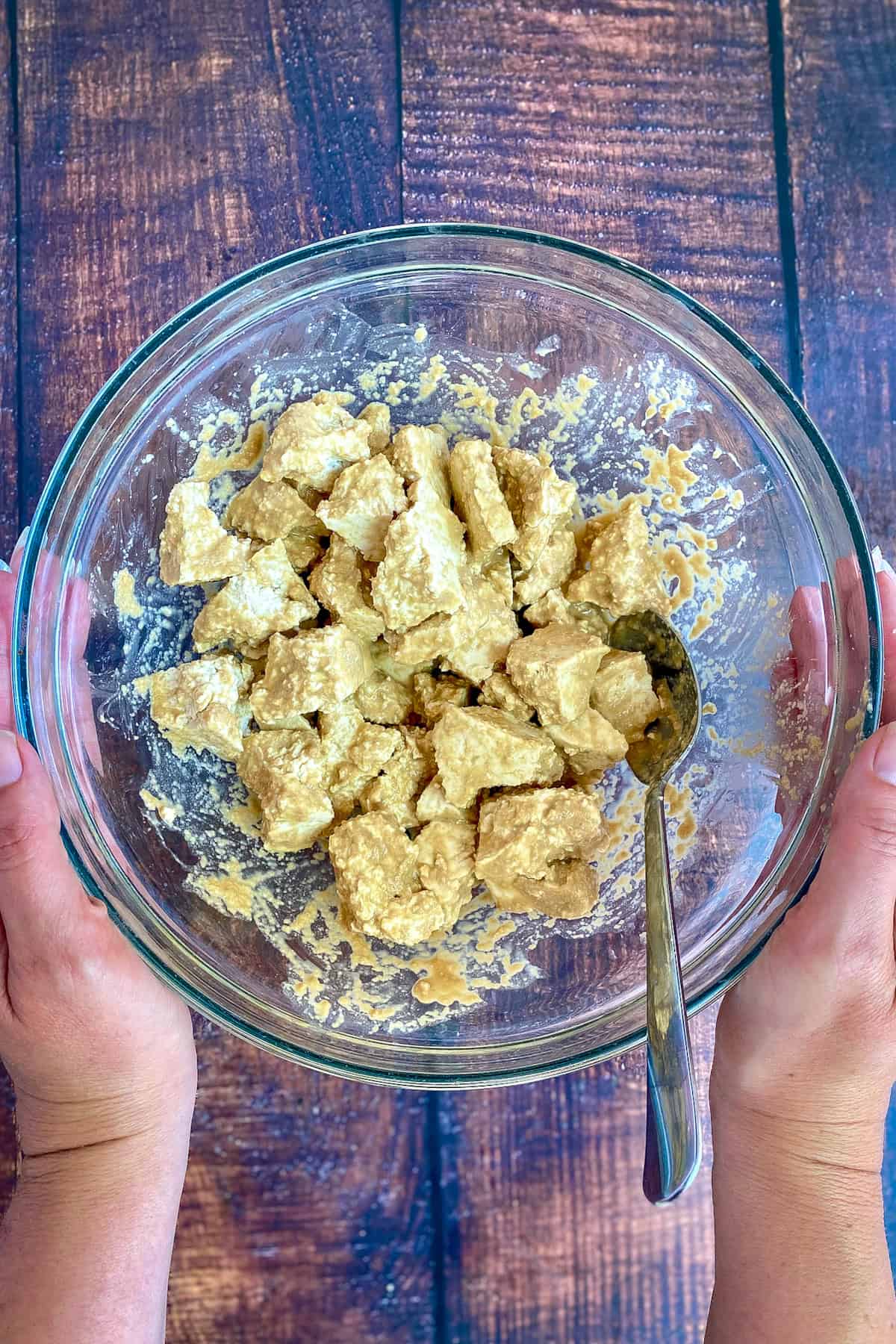Seasoned tofu chunks in a bowl.